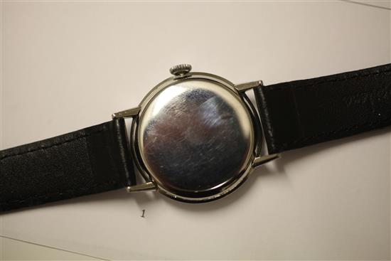 A gentlemans 1940s stainless steel Omega manual wind wrist watch,